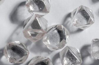 De Beers’ parent company reduces value by almost half